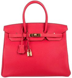 Red Top Handle Bag With Lock, Elegant Red Bags With Lock, Luxury Red Bag With Lock, Gold Bag With Lock For Shopping, Gold Shopping Bag With Lock, Gold Shopping Bag With Lock Detail, Gold Shopping Bags With Lock, Red Travel Bags With Palladium Hardware, Luxury Red Bag With Gold-tone Hardware