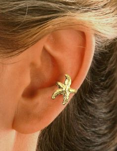 "Ear Charms® Fun Starfish Ear Cuff Non-Pierced Side Cartilage Non-pierced Earring Crawler - Reminiscent of the Seaside & Reminds Us of Summer. Solid Sterling Silver 925 Starfish, Also available in Yellow Gold or White Rhodium over the Sterling Silver for a Carefree Finish. Fully Adjustable, Comfortable & Secure Carry or Gift Box to keep them in & Simple Instructions Included. Ear Charms® Inc. 1982 - 2021 / Sandra Callisto designer (Hand carved & cast using the \"Lost Wax Method\" Adjustable Summer Ear Cuff As Gift, Summer Star-shaped Jewelry For Pierced Ears, Gold Star Earrings For Summer, Ear Cuff Earrings, Jewelry Beautiful, Climber Earrings, Ear Cuff Earings, Dope Jewelry, Funky Jewelry