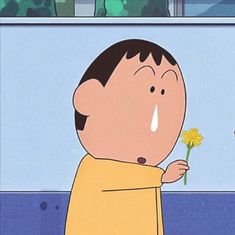 a cartoon character holding a flower in his hand