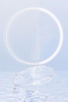 a glass plate sitting on top of a table next to a circular object in the water