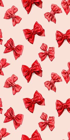 many red bows on a light pink background