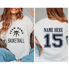 PERSONALIZED Basketball Shirt,Custom Name Number Basketball Shirt,Gift For Basketball Lover,Basketball Mama,Basketball Player Gift,Sport tee, Basketball Tee for Mom Dad Nana, Basketball Season Shirt, Sports Mom Tee, Basketball Game Day Shirt Beautiful artwork for all Basketball lover   This tee is the cutest gift for baseball mom, Basketball dad, Basketball nana, Basketball sister and a great gift idea for  Basketball Game Day, Basketball Season, Birthday gifts, family photos and pictures. 👉HOW TO ORDER👈 1️⃣ Please review all the information provided before placing an order 2️⃣ Select the shirt type and size using the drop down menu. 3️⃣ Select the color of the shirt using the following drop down menu. 4️⃣ Need more Items? Add the current item in the cart. And If you like to add more ite Varsity Basketball Tops With Team Logo, Basketball Fan Apparel Tops With Short Sleeves, Sporty Basketball Team Tops, Team-colored Tops With Team Logo For Basketball, Team-colored Basketball T-shirt With Team Logo, Basketball Team Spirit Tops With Team Logo, White Basketball Team Logo Tops, White Basketball Team Logo Top, Cotton Basketball Top With Team Logo