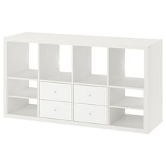 a white bookcase with four drawers and three bins on the bottom, one is open