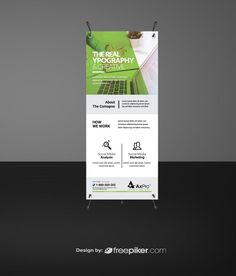 a roll up banner with an image of a laptop on it