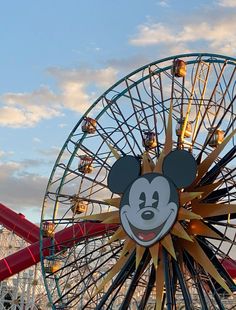 a ferris wheel with a mickey mouse face on it