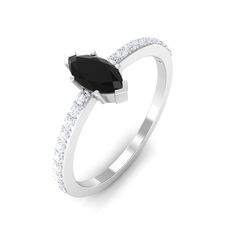 Product Details Commit her to be loved always by you with this Marquise Engagement Ring. Being adorned with Marquise Cut Black Onyx in the center in a V prong setting and Round Diamond as a side stone on this Engagement Ring. Composed of Gold Metal, this Black Onyx Engagement Ring is the perfect jewelry for your beloved. Product Information SKU SHP-RINGS082211739 Weight 2.24 gm (Approximate) BLACK ONYX INFORMATION No.of Stones 1 Pieces Total Weight 0.74 Carat (Approximate) Dimension(approx) Marquise-4X8 mm-1 Pcs Color Black Cut Brilliant Shape Marquise Setting Type V-Prong-Setting Quality Grade AAA DIAMOND INFORMATION No.of Stones 20 Pieces Total Weight 0.20 Carat (Approximate) Dimension(approx) Round-1.30X1.30 mm-20 Pcs Color HI Cut Brilliant Shape Round Setting Type V-Prong-Setting Quali Marquise Setting, Marquise Engagement Ring, Black Onyx Engagement Ring, Onyx Engagement Ring, Engagement Rings Marquise, Ring With Diamond, 18k Yellow Gold Ring, To Be Loved, Onyx Ring