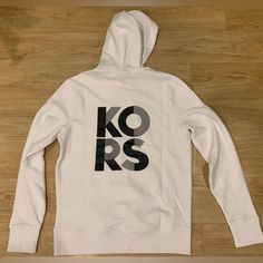 Michael Kors Men’s Graphic Logo Cotton Blend Pullover Hoodie White Nwt S - L White Logo Hoodie For Winter, White Logo Hoodie For Fall, White Athleisure Sweatshirt With Branding, White Crew Neck Hoodie With Logo, White Crew Neck Hoodie With Logo Detail, White Logo Sweatshirt For Winter, White Sporty Logo Hoodie, White Sporty Hoodie With Logo, Casual White Hoodie With Branding