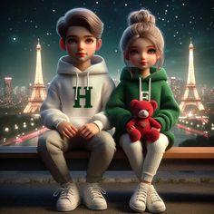 two children sitting on a ledge in front of the eiffel tower at night