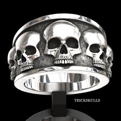 Black Enamel Five Skull Band Ring Hand Painted Punk Skulls Sizes 7 8 9 10 11 New & Sealed! This Minimalist Skull Band Has Detailed Alloy Casting And Hand Painted Black Enamel Highlights. The Classic Design Spans Modern And Vintage Styles From Punk And Metal To Emo And Gothic. Ships Free, New & Sealed In A Black Velvet Jewelry Pouch. See Our Other Items For More Skull And Dark Themed Jewelry. Outfits Alt, Rings Skull, Goth Ring, Dark Punk, Sterling Silver Skull Rings, Mens Skull Rings, Punk Skull, Mens Stainless Steel Rings, Silver Skull Ring