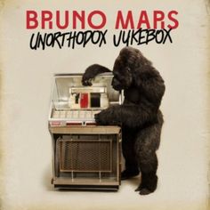 the album cover for bruno maps, featuring a gorilla holding an electronic device