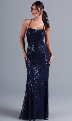 Simply gorgeous, this exciting long sequin prom dress is an exclusive style sold only at PromGirl. The fully-lined long formal dress has a sheer overlay that boasts a shimmering sequin pattern from the neckline to the hem of the curve-hugging long skirt. Supportive spaghetti straps round the shoulders before creating a statement by crossing the open back and tying into a bow. For a sparkly look at prom, fancy galas, and other black-tie formal events, slip into this luxurious statement-back long Blue Sparkly Prom Dress, Navy Prom Dresses, Long Formal Dresses, Dresses For Prom, Simply Dresses, Long Formal Dress, Look Plus Size, Blue Dress Formal, Sequin Prom Dress