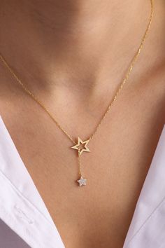 "Star Lariat necklace, Gold Star Lariat, Dainty Gold Lariat Necklace, Dangling Sterling Silver Necklace, Star Necklace, Mother's Day Gift Dainty gold star lariat necklace, perfect to wear by itself for a minimal look or layer it up with other necklaces. * All our jewelry is custom made by hand with care in our workshop The length option is the TOTAL chain length (including the charm). If you order an 18\" chain, the piece will come as CHAIN + CHARM = 18\". All pieces will come with a 1\" extensi Adjustable Star-shaped Necklace With Delicate Chain, Adjustable Star Shaped Charm Necklace With Adjustable Chain, Adjustable Star Charm Necklaces, Adjustable Star Charm Necklace, Elegant Star-shaped Lariat Necklace Gift, Elegant Star Lariat Necklace Gift, Gold Lariat Necklace With Star Charm, Lariat Necklaces With Star Charm For Gift, Gift Lariat Necklace With Star Charm