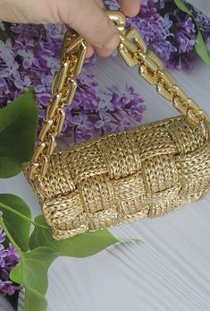 Chic Gold Bags With Intrecciato Weave, Gold Rectangular Bag With Intrecciato Weave, Rectangular Woven Straw Bag, Gold Woven Top Handle Straw Bag, Luxury Gold Straw Bag With Braided Handles, Luxury Daily Use Woven Crochet Bag, Luxury Woven Crochet Bag For Daily Use, Luxury Gold Shoulder Bag With Braided Handles, Chic Gold Straw Bag With Braided Handles