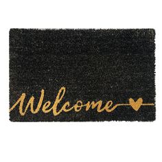 a welcome mat with the word'welcome'written in gold foil on black background