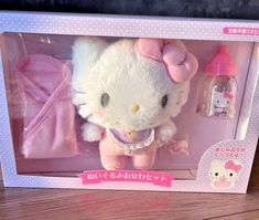 the hello kitty doll is in its box