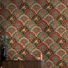 an ornate wallpaper design with red, green and blue colors in the middle is shown