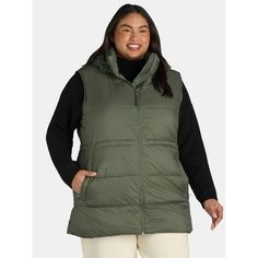 As temps begin to dip, make sure you have Ozark Trails Hooded Puffer Vest on hand. More than just your average puffer jacket, this puffer vest features adjustable bungee cords at the stand collar and waistline for added protection to help keep the cold out. Crafted in wind-and-water resistant taffeta with lightweight, plush filling that helps keep you comfy and cozy without weighing you down. An easy-to-layer silhouette youll love, this puffer vest is destined to be your new go-to cold-weather staple. Only at Walmart. Size: 1X.  Color: Green.  Gender: female.  Age Group: adult. Hooded Puffer Vest, Soft Vest, Bungee Cords, Womens Puffer Vest, Ozark Trail, Hooded Vest, Womens Crewneck, Outerwear Vest, Sleeveless Jacket