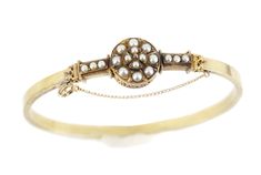 "Antique 14K Yellow Gold Delicate Victorian Seed Pearl Bangle Bracelet 6\" The item being offered is a stunning antique 14K yellow gold delicate Victorian era salt water seed pearl cluster bangle bracelet. The bangle does open via a slide insert to allow for easy access. A delicate chain with a spring ring type clasp acts as an extra saftey measure. The spring ring is marked 14K. Measurements Wrist Size: 6\" inches Setting Size: 12mm x 12mm x 8mm Band Width: 3mm Pearl Sizes: 2mm-3mm Weight: 7.9 Antique Jewelry Victorian, Pearl Bangle Bracelet, Gold Pearl Bracelet, Pearl Bangle, Jewelry Lockets, Cameo Jewelry, Pendant Watches, Victorian Gold, Pearl Cluster