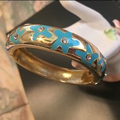 Nwot Gold & Turquoise Enamel Floral Hinge Bangle With Crystal Accents Like New/Worn Once (I’ve Never Been Able To Get Use To Bangles Really, My Wrists Are So Small) This Bangle Is Gorgeous And A Definite Statement Piece :) Super Shiny And Turquoise Enamel Flowers With Crystal Accents Very Sturdy, Thick And Made Well Spring Open Hinge It Fits Most Any Wrist 7 1/2” Or Above *Offers Are Welcome* Thank You For Shopping My Closet Spring Turquoise Bracelet Jewelry, Spring Turquoise Jewelry Bracelet, Spring Party Blue Bracelets, Enamel Flower, Hinged Bangle, Womens Jewelry Bracelets, Blue Gold, Bangles, Shop My