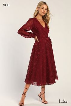 Classy and chic come together in perfect harmony to create the Lulus Evening of Elegance Burgundy Floral Jacquard Wrap Midi Dress! Lightweight woven fabric, with a floral jacquard pattern, shapes this fabulous dress that has a surplice neckline and sheer long sleeves with button cuffs. Adjustable wrap silhouette, with tying waist sash and hidden internal ties, ends at a slightly ruffled midi hem. Fit: This garment fits true to size. Length: Mid-calf length. Size medium measures 47" from shoulder Burgundy Wedding Guest Dress, Wedding Guest Outfits, Under Your Spell, Long Sleeve Wrap Dress, Guest Attire, Wedding Attire Guest, Theme Color, Midi Ruffle Dress