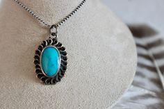 "* Metal: Sterling silver * Gemstone: Genuine Kingman Turquoise * Measurements: * Pendant: 1 1/4\" x 3/4\" * Chain: 16\" * Total Length: 17 1/4 \" *Please feel free to contact if you have any questions about specific details regarding this item * Please see all photos for quality/condition details (*Note: Due to the many variations in monitors, phone screens and browsers.. colors may appear slightly different) Our vintage treasures hold secret stories in every detail along with traditions that h Western Style Nickel-free Turquoise Necklace, Western Sterling Silver Turquoise Necklace, Western Style Sterling Silver Turquoise Necklace, Southwestern Concho Necklace As Gift, Southwestern Style Concho Necklace As Gift, Turquoise Concho Necklace As Gift, Southwestern Style Concho Necklace For Gift, Southwestern Sterling Silver Turquoise Necklace, Western Blue Concho Necklace