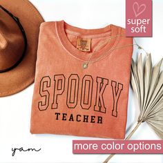 - This Is A Premium Comfort Colors®  Shirt - 5/31/24 PLEASE READ INFORMATION BELOW: Get into the spooky spirit with our Comfort Colors®  Teacher Halloween Shirt! This retro-inspired, Fall Teacher Shirt makes the perfect Teacher Gift for the best teachers out there.  Ideal for back to school, this cute ghost teacher t-shirt is a must-have for any school Halloween event. Shop now for the best Teacher Tee and make your Halloween extra special with this inspirational shirt for women.  We are so conf Trendy Fall T-shirt For School, Spooky Long Sleeve Shirt With Letter Print, Long Sleeve Shirt With Letter Print In Spooky Style, Soft-washed T-shirt For College In Fall, Trendy School T-shirt For Fall, Fall School Top With Text Print, Fall School Tops With Text Print, School Spirit Screen Print Tops For Fall, Fall School Spirit Screen Print Tops