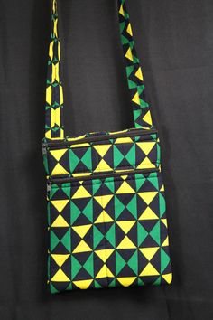 Check out this Green Ankara man bag. Its small, fun and funky. The perfect replacement for you wallet or purse for that quick trip to the shop. Don't judge a bag by its size, there is loads of space in this bag, with 3 outer pockets and 2 inner pockets. We are a brand with a purpose! All our bags are handmade in Africa, by Africans, with the aim of providing full time and sustainable employment to local craftspeople.  Read our full story on www.conitnentclothing.com Man Bag features - Large Volu Green Rectangular Pouch For On-the-go, Green Rectangular Phone Bag For Daily Use, Green Rectangular Travel Pouch, Rectangular Green Travel Pouch, Green Square Shoulder Bag With Cell Phone Pocket, Portable Yellow Phone Bag For Everyday Use, Green Shoulder Bag Pouch For Everyday, Green Crossbody Pouch For Everyday Use, Green Zipper Travel Pouch