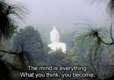 a buddha statue in the middle of trees with a quote on it that says, the mind is everything what you think, you become