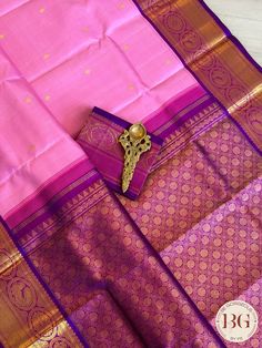 Indulge yourself in the luxury of our Kanjeevaram pure silk handloom saree in a beautiful pink and purple color combination. Handcrafted with intricate details and made from pure silk, this saree is not only a stunning addition to your wardrobe but also a timeless piece of art. Elevate your style and make a statement with this exclusive saree. Kanjeevaram pure silk handloom saree - pink purple Saree comes with a blouse piece. Fall and pico done. Fully stitched blouse shown in pictures is optional and can be purchased seperately from our blouses and croptops section. For saree video please connect with us on whatsapp @469-937-0606 Ready to be shipped in USA from San Diego, California. All pictures are original pictures. Colors may slightly vary due to pic resolution. Pink Traditional Silk Mark Certified Wear, Pink Silk Mark Certified Traditional Wear, Traditional Pink Silk Mark Certified Saree, Pink Silk Mark Certified Traditional Wear For Diwali, Elegant Pink Paithani Silk Traditional Wear, Festive Pink Silk Mark Certified Saree, Elegant Pink Saree For Puja, Diwali Pink Silk Mark Certified Saree, Pink Silk Mark Certified Saree