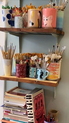 the shelves are filled with different types of art supplies