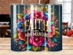 two coffee mugs with the words faith can move mountains printed on them, sitting on a table