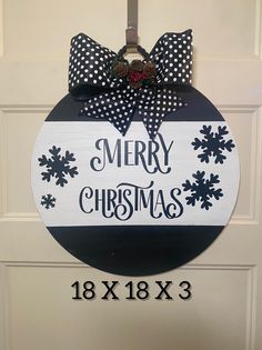 Welcome the holiday season with this charming Merry Christmas wood sign! Handcrafted with care, this delightful piece is perfect for adding a rustic touch to your holiday decor. Painted with black and white acrylic paint, permanent vinyl lettering creates a cozy and inviting atmosphere that will make your home feel festive. This sign is versatile and can be displayed on your front door, above the fireplace, or anywhere you choose! Its timeless design makes it a great addition to both traditional and modern decor styles, bringing a sense of joy and cheer to any space. Whether you're treating yourself or searching for the perfect gift for friends and family, this Merry Christmas sign is sure to spread holiday cheer. Celebrate the season in style with this lovely wooden sign that captures the Front Door Wood, Christmas Door Sign, Christmas Front Door, Merry Christmas Sign, Christmas Signs Wood, Home Decor Christmas, White Acrylic Paint, Christmas Home Decor, Christmas Sign