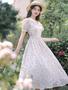 Embrace the vintage cottagecore aesthetic with this enchanting floral fairy dress! Its delicate design and nostalgic feel will transport you to a whimsical land of adventure and daring. Decorated with a floral print, intricate details, puff sleeves and delicate lace trims. Size: S Bust: 80cm Waist: 66cm Length: 111cm Size: M Bust: 84cm Waist: 70cm Length: 112cm Size L Bust: 88cm Waist: 74cm Length: 113cm Size XL Bust: 92cm Waist: 78cm Length: 114cm Fairycore Short Sleeve Dress For Garden Party, Spring Fairycore Floral Print Dresses, White Fairycore Dresses With Floral Print, White Floral Print Fairycore Dress, Feminine Vintage Dress For Garden Party, Fairycore Vintage Dress With Ruffles For Garden Party, Summer Fairycore Vintage Dress, Flowy Vintage Dress For Garden Party, Cottagecore Prairie Dress With Ditsy Floral Print For Spring