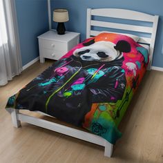 a bed with a panda bear on it