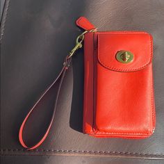 Good Condition, Never Used, Orange Wrist Wallet With Many Pockets From Coach. Coach Wallets With Cell Phone Pocket For Daily Use, Classic Travel Wristlet With Removable Pouch, Classic Wristlet With Removable Pouch For Travel, Coach Clutch Wallets For Everyday Use, Coach Wallet With Snap Closure For Everyday Use, Coach Clutch With Card Slots For Everyday, Coach Wallets With Snap Closure For Daily Use, Coach Wallets For Everyday Use, Everyday Coach Wallet With Removable Pouch