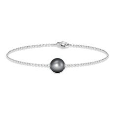 Product Details Elevate your style with this Round Cut Tahitian Pearl Bracelet, crafted with a Bead Set design. The Solid Gold bracelet is a stunning addition to any outfit and is the perfect way to make your loved one feel cherished. Product Information SKU SHP-BRACELET102110010 Width 8 mm Height 8 mm Weight 2.00 gm (Approximate) TAHITIAN PEARL INFORMATION No.of Stones 1 Pieces Total Weight 8.09 Carat (Approximate) Dimension(approx) Round-8X8 mm-1 Pcs Color Black Cut Brilliant Shape Round Setting Type Bead-Set Quality Grade AAA View More 14k Rose Gold Bracelet, Tahitian Pearl Bracelet, Solid Gold Bracelet, Yellow Gold Bracelet, Tahitian Pearls, Signature Jewelry, Timeless Jewelry, June Birth Stone, Tahiti