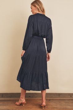 This midi length shirt dress has long bubble sleeves, half button placket, and tiered skirt. Comes with a sash waist tie. Model is 5'9" and wearing size Small. Size chart in pictures. Tiered Skirt, Tiered Dress, Knit Tanks, Waist Tie, Autumn Winter Fashion, Midi Length, Knit Top, Cold Shoulder Dress, Winter Fashion