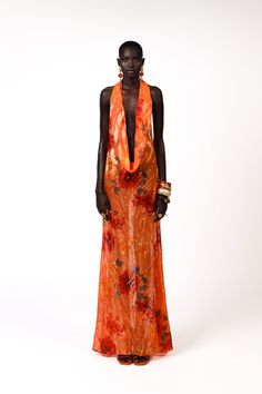 The Kept dress is undeniably a summer staple, it's iconic and made for vacation wear. With a fluid and smooth silhouette, the kept dress falls across the body in an effortless manner. It's cut from a luxurious lightweight burnout silk and printed with oversized flowers in various sunset hues. The signature front cowl perfectly balances the daringly cut back with a tie strap detail. Orange Vacation Outfits, Long Jacket Dresses, Oversized Flowers, Orange Gown, Birthday Fit, Sunset Hues, Vibrant Dress, Tropical Fashion, Embellished Clothing