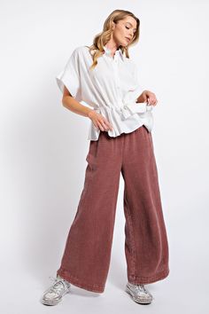 These Easel Cotton Gauze Pants offer an effortlessly relaxed style, featuring a smocked waist, mineral wash and wide legs. Comfortably fitted with side pockets, they offer a stylish look without sacrificing comfort. Perfect for everyday wear and casual outings. Material and Care 100% Cotton Hand wash cold Hang to dry Measurements Small Waist:24" Inseam:27.5” Length:37.5” Medium Waist:25 ” Inseam:28” Length:38” Large Waist:26” Inseam:28.5” Length:38.5” 1X Waist:27” Inseam:29” Length:39” 2X Waist: Cotton Gauze Pants, Gauze Pants, Your Twenties, Linen Fashion, Stylish Pants, Wide Legs, Women Clothing Boutique, Comfy Fits, Small Waist