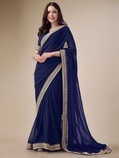 Navy Blue And Gold-Toned Embroidery Detailed Saree - Inddus.com Navy Blue Georgette Saree, Dusty Blue Saree, Navy Blue Blouse Designs For Saree, Blue And Gold Saree, Western Saree, Tamil Saree, Navy Blue Saree, Blue Blouse Designs, Indian Culture And Tradition