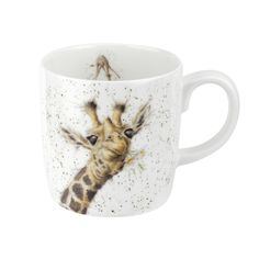 a coffee cup with a giraffe painted on it