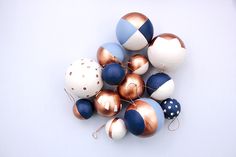 a pile of blue and white ornaments on top of each other