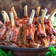 ribs covered in bbq sauce and toothpicks on a plate