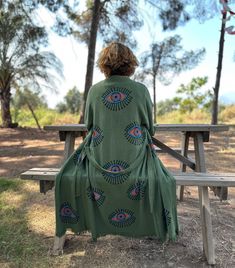 Handmade Evil Eye Boho Festival Kimono, Organic Muslin Evil Eye Kimono Robe, Boho Beachwear, Bohemian Festival Robe, Turkish Cotton Bathrobe Handmade wood print green kimono is a kimono that will wrap your skin with its soft texture. Evil eye robe made of organic muslin fabric is breathable. Personalised evil eye kimono can be a special luxury daily outfit. ✨ Evil eye kimono in a festival atmosphere that you can use indoors and outdoors. ✨ Your bridesmaids will love these personalised kimonos. Y Luxury Green Kimono For Festivals, Green Bohemian Maxi Length Kimono, Beach Embroidered Green Maxi Dress, Beach Green Embroidered Maxi Dress, Green Embroidered Maxi Dress For Beach, Hippie Long Green Kimono, Bohemian Green Tunic Kimono, Green Tunic Kimono For Beach Cover-up, Green Long Bohemian Kimono