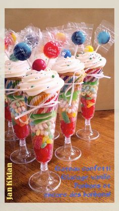 candy filled wine glasses with candies in them