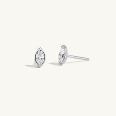 td {border: 1px solid #ccc;}br {mso-data-placement:same-cell;} td {border: 1px solid #ccc;}br {mso-data-placement:same-cell;} Details Solid 14K gold architectural studs with prong set marquise diamonds. Measurements Carat Weight: 0.34 Shipping Each piece of jewelry is carefully hand fabricated in our NYC studio so please allow 2-3 weeks for delivery. If you would like to request a rush order please contact the studio at sophie@sophieratner.com. Selecting faster shipping options will not speed up Brilliant Cut Marquise Diamond Earrings For Formal Occasions, Marquise Cubic Zirconia Diamond Earrings With Prong Setting, Sterling Silver Marquise Diamond Earrings With Prong Setting, Formal Marquise Diamond Earrings With Prong Setting, Marquise Diamond Cut Earrings For Formal Occasions, Timeless Marquise Diamond Earrings For Formal Occasions, Timeless Marquise Diamond Earrings For Formal Events, Formal Marquise Diamond Cut Earrings, Marquise Sterling Silver Diamond Earrings