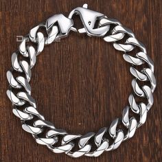 REMARKABLE 15MM STAINLESS STEEL MEN'S CUBAN LINK BRACELET. AN EVEN BETTER DISCOUNT. Interested in our 15mm Stainless Steel Men's Cuban Link Bracelet? Well, great minds think alike, because our team is holding an exclusive 31% off on the 15mm Stainless Steel Men's Cuban Link Bracelet today! Choose from our popular sellers such as Matte Polished Men's Cuban Link Bracelet -- all priced at just US $15.94! This offer won't last long, so ADD TO CART now to save US $23.91! 15MM STAINLESS STEEL MEN'S CU Luxury Stainless Steel Cuban Link Bracelet, Luxury Men's Bracelet With Curb Chain, Polished Man, Boy Cut, Hip Hop Jewelry, Cuban Link Chain, Cuban Chain, Cuban Link, Metal Bracelets