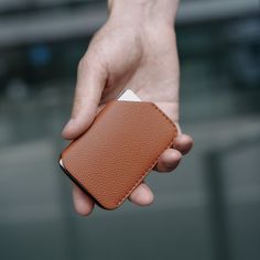 A sleek and exceptionally minimalistic wallet that effortlessly fits into your pocket and contains only the essential items you require. A gentle tap on the corner of the cards enables easy access to all the necessary contents of the wallet. Despite its compact size, it holds everything you need. It is perfect for securely storing your ID and the other six most important cards, keeping them organized in one easily accessible location. ▸ Fits up to 6 cards ▸ Personalize your card holder - add up Minimalist Trifold Wallet For Everyday, Minimalist Trifold Wallet For Everyday Carry, Modern Trifold Wallet With Smooth Grain For Daily Use, Minimalist Trifold Wallet With Rfid Blocking For Everyday Use, Minimalist Trifold Wallet With Card Slots For Everyday, Modern Trifold Wallet With Rfid Blocking For Everyday, Minimalist Rfid Blocking Card Holder For Business, Minimalist Rectangular Card Holder For Everyday Use, Minimalist Trifold Wallet For Business