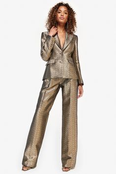 This item is final sale. Cut in a wide-leg silhouette, the metallic O'Connor trousers boast a high rise and pleated construction. Features: Banded waist Belt loops Zip fly with hook-and-eye closure Waist slant pockets Back welt pockets Lining: 100% polyester 100% polyester Dry clean Made in USA Model is shown in a size 2. We recommend ordering true to size, knowing the set is meant to be loose fitting. Gold Outfit Ideas, Trendy Date Night Outfit, Gold Suit, Pant Suits For Women, Urban Chic Fashion, Vegas Outfit, Gold Outfit, Old Hollywood Glam, Metal Clothing