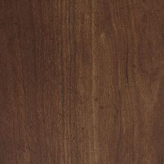 a close up view of the wood grains on this wooden surface, which is very dark brown